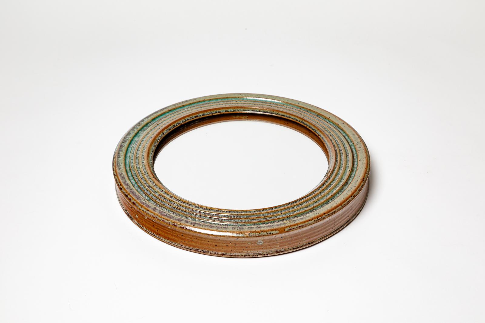 Mid-Century Modern 20TH CENTURY DESIGN Miroir mural en céramique marron et vert par Fabien Comte 1970 en vente
