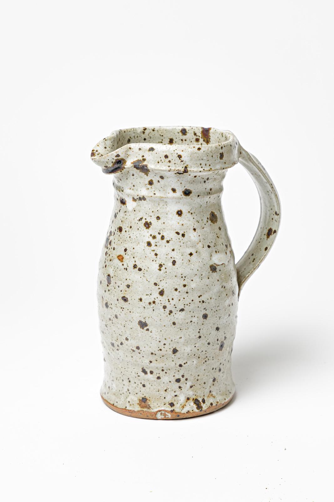Gustave Tiffoche

20th century grey stoneware ceramic pitcher

Unique handmade piece

Signed 

Height 20 cm
Large 15 cm