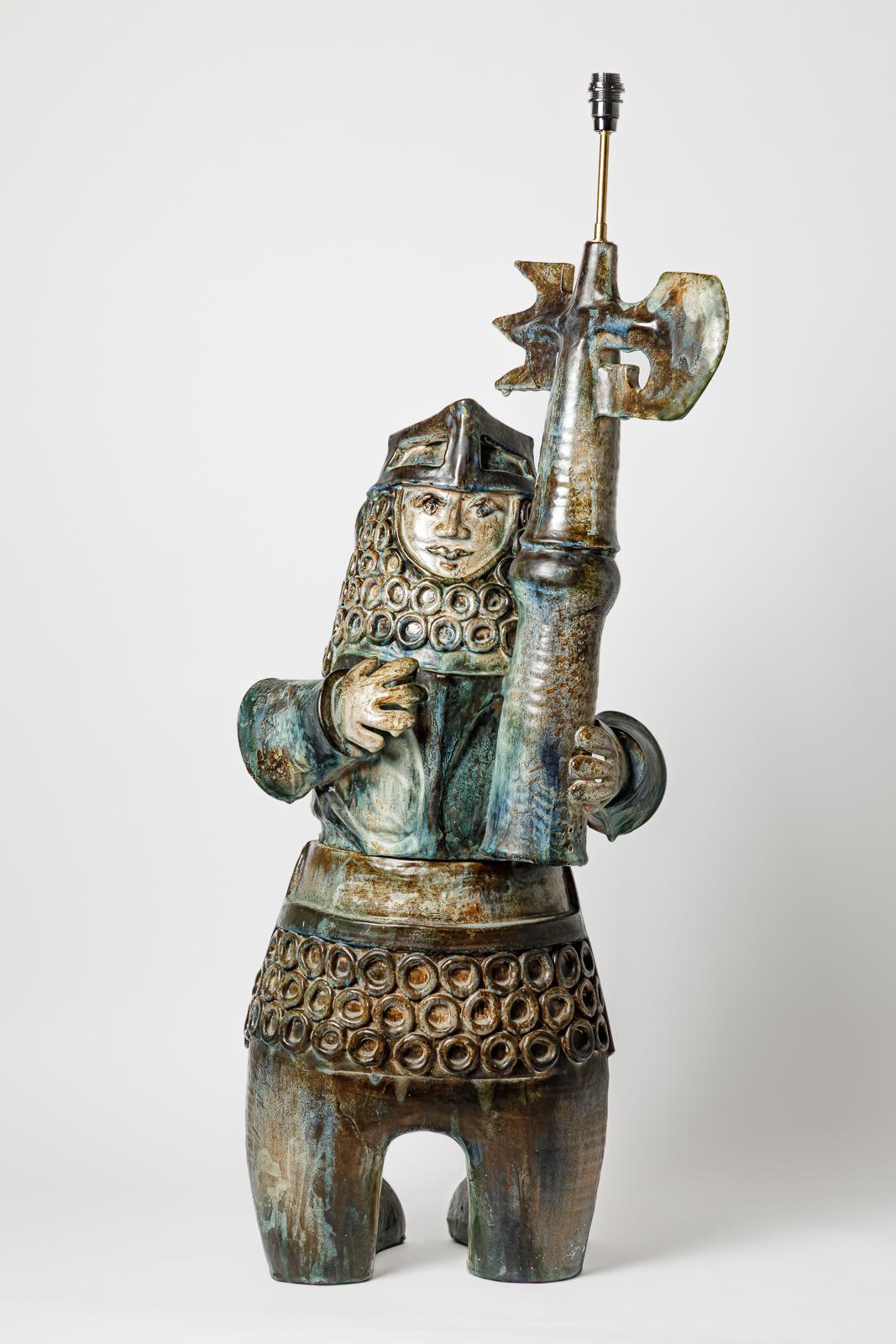Warrior ceramic figure - unique handmade piece

Monumental warrior castle ceramic sculpture and floor or table lamp

Original parfect condition

Realised circa 1970 in France 

Colored in blue grey and green ceramic glazes colors

Electrical system