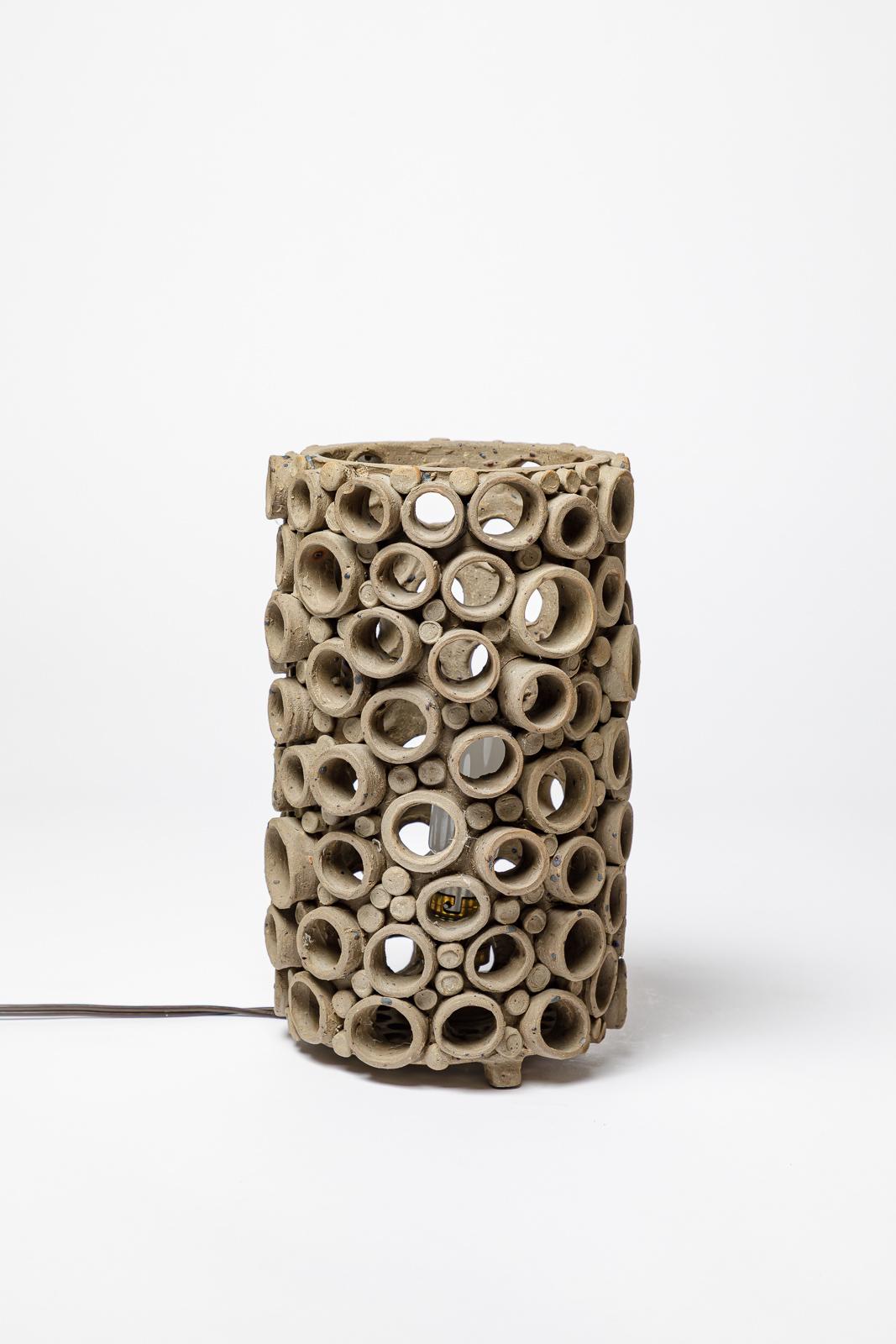 Mid-Century Modern 20th century design perforated grey stoneware ceramic architectural table lamp For Sale