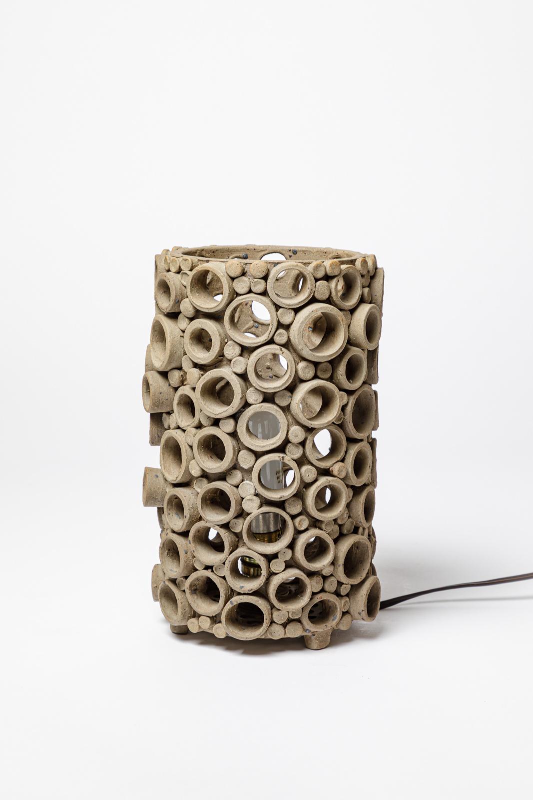 French 20th century design perforated grey stoneware ceramic architectural table lamp For Sale