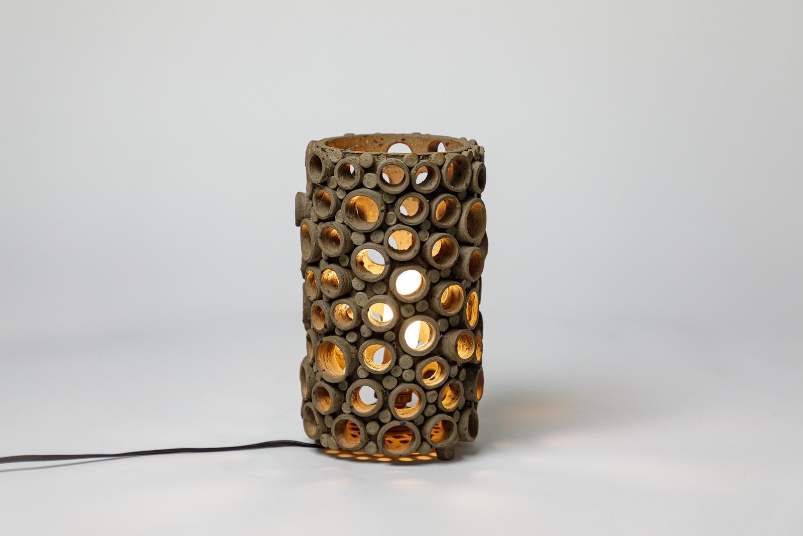 20th Century 20th century design perforated grey stoneware ceramic architectural table lamp For Sale