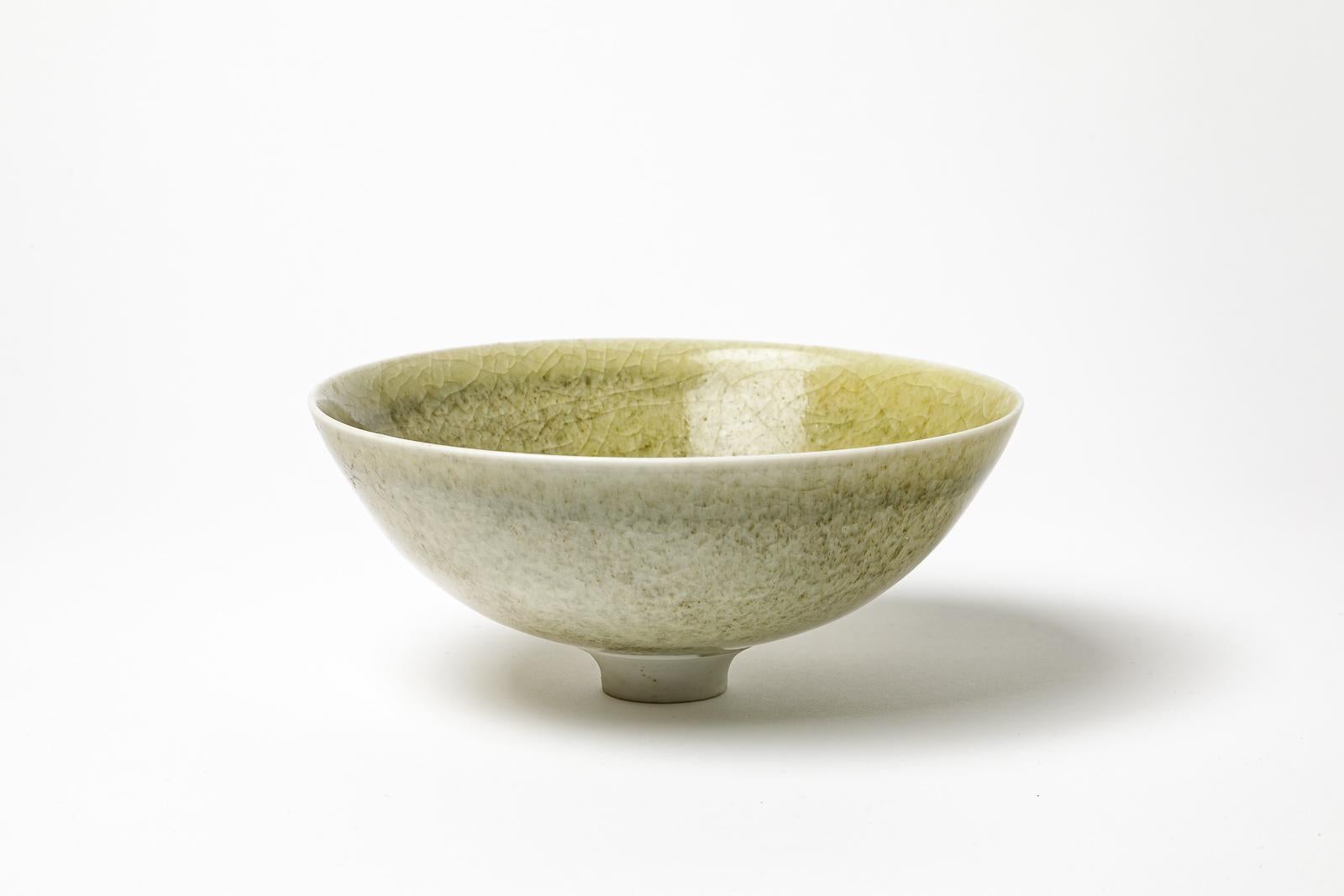Jacques Buchholtz

Elegant porcelain ceramic cup or bowl

Signed under the base

Green celadon ceramic glaze color

height 7 cm

Large 17 cm.