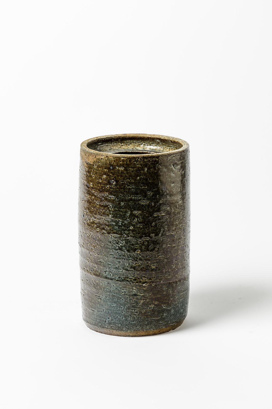 Bernard Prigent.

Realised in La Borne circa 1970-1975.

Large and radical stoneware ceramic cylinder vase.

Signed under the base.

Original perfect condition.

Measures: height 24 cm
Large 14 cm

