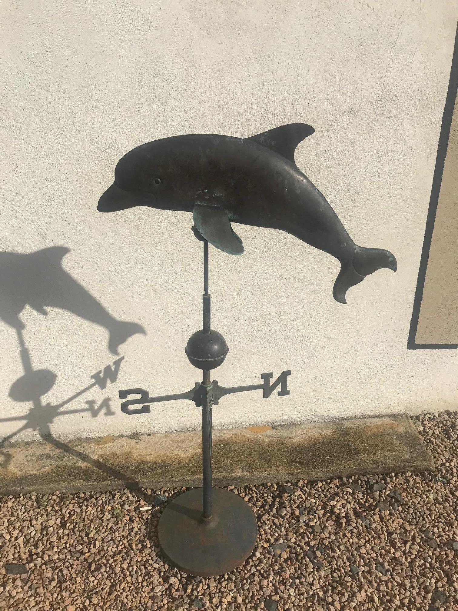 Beautiful and rare 20th century Dolphin zinc weathervane from the 1940s.
Indicates the east, west, north and south.
The dolphin is moving with the wind.
Good condition and quality.