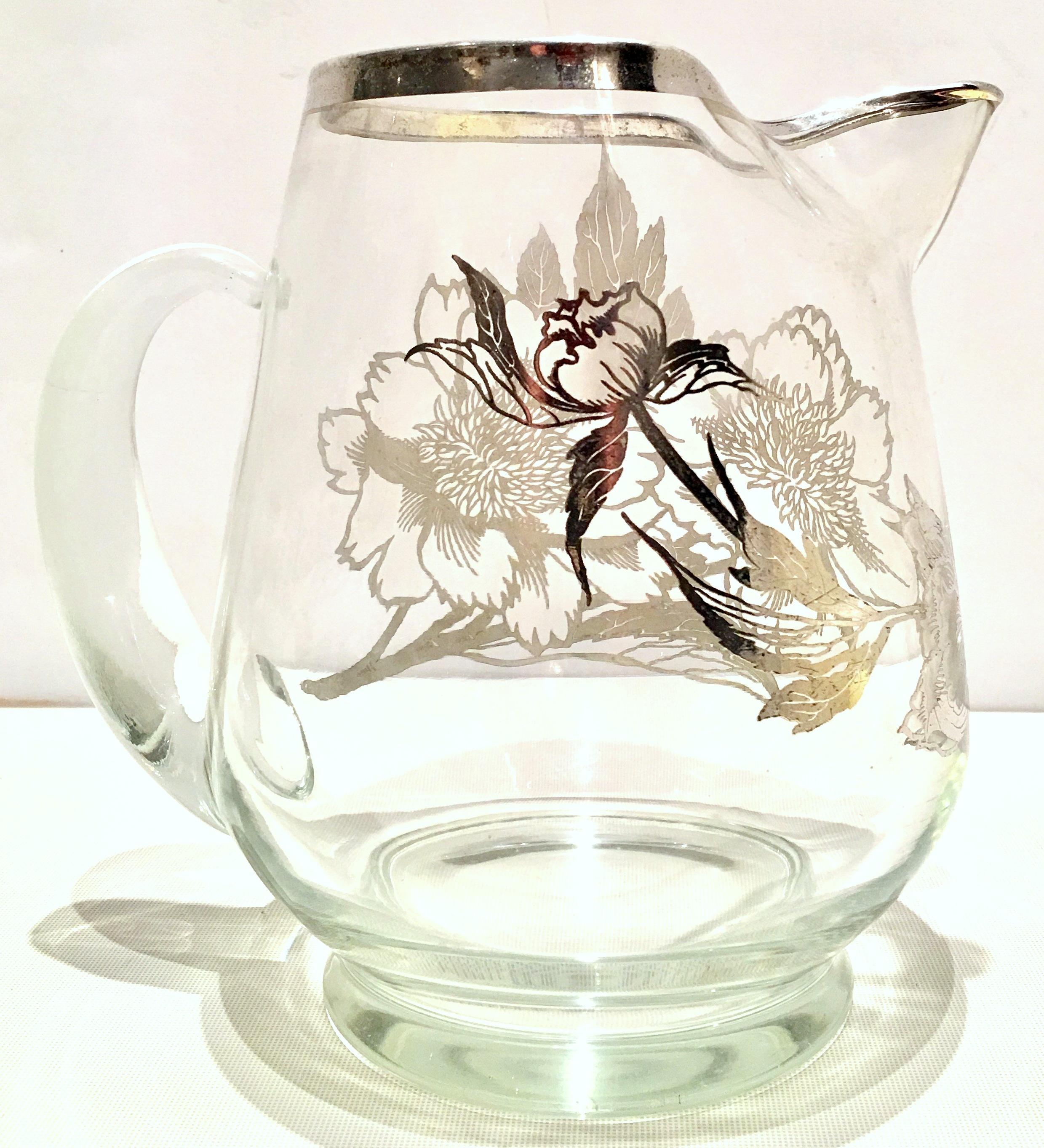 20th Century Modern sterling silver overlay floral motif blown clear b;own glass handled pitcher by, Dorothy Thorpe.