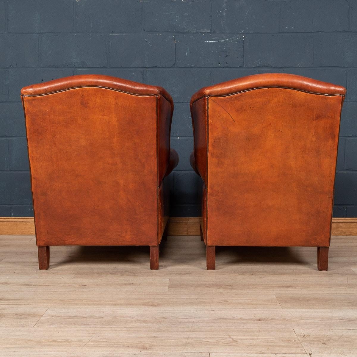 20th Century Dutch Sheepskin Leather Wingback Chairs In Good Condition In Royal Tunbridge Wells, Kent