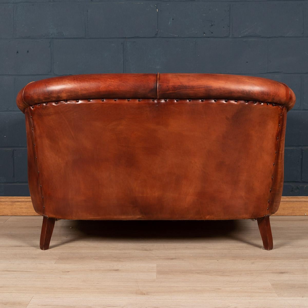20th Century Dutch Two Seater Tan Sheepskin Leather Sofa In Good Condition In Royal Tunbridge Wells, Kent