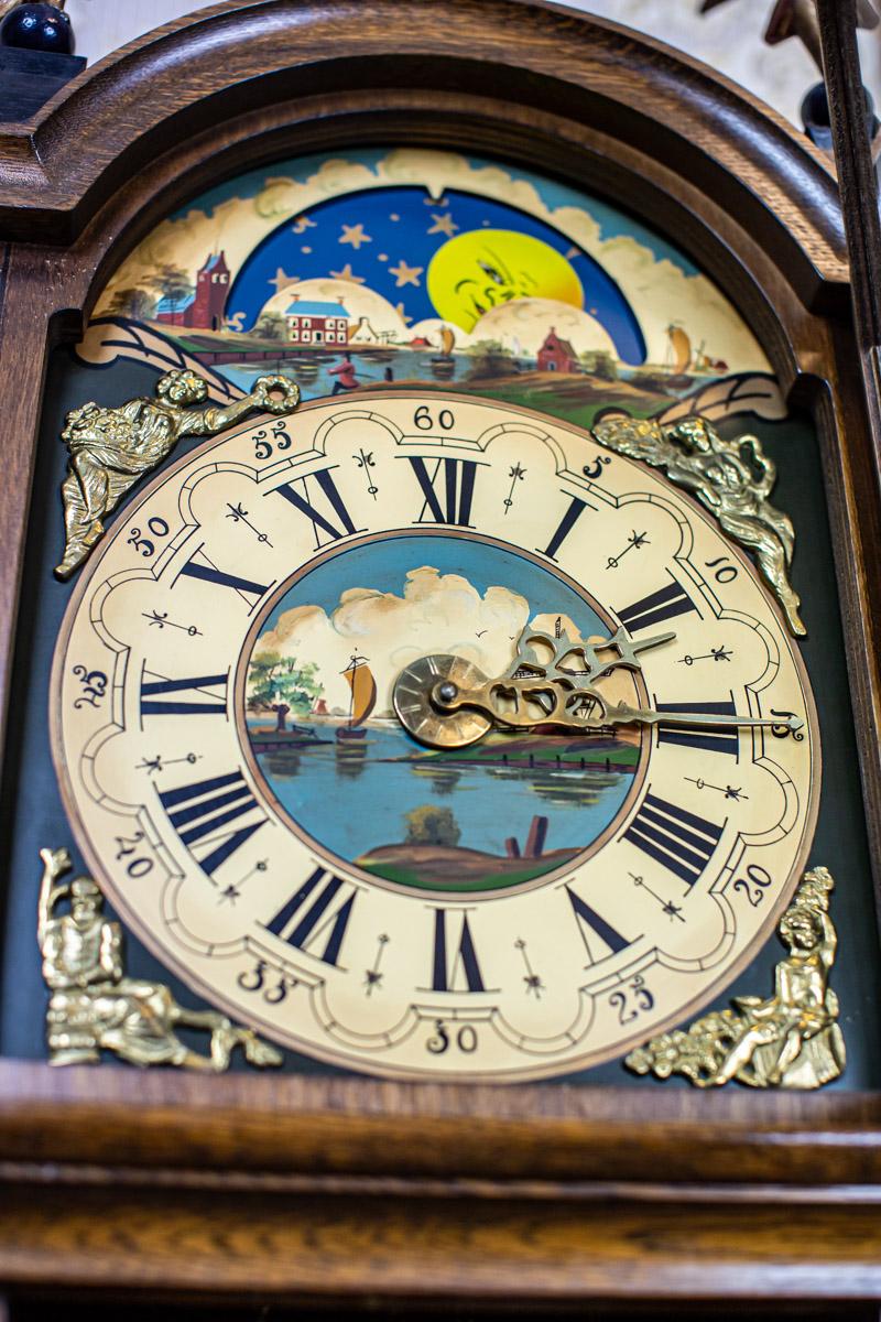 Brass 20th Century Dutch Wall Clock Stylized as Staarta in Brown Oak Case