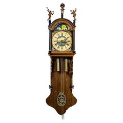 holländische Wanduhr des 20. Jahrhunderts:: stilisiert als Staarta:: in braunem Eichenholzgehäuse