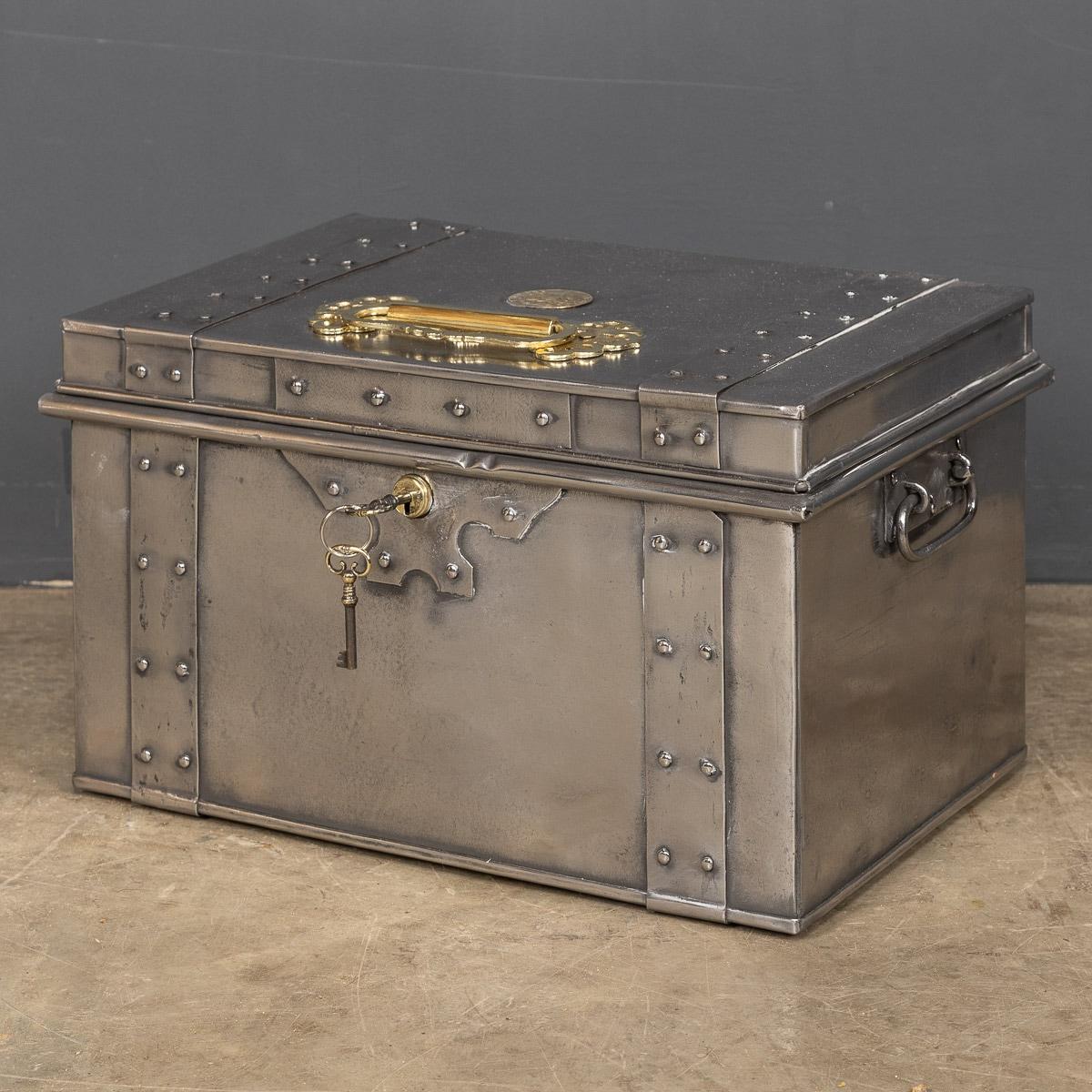 Antique early-20th century Edwardian cast iron safe, primarily used for the transport of document or valuables this was one of the first fireproof safes available. This piece has its original key. It would have been taken on long travels, perhaps on