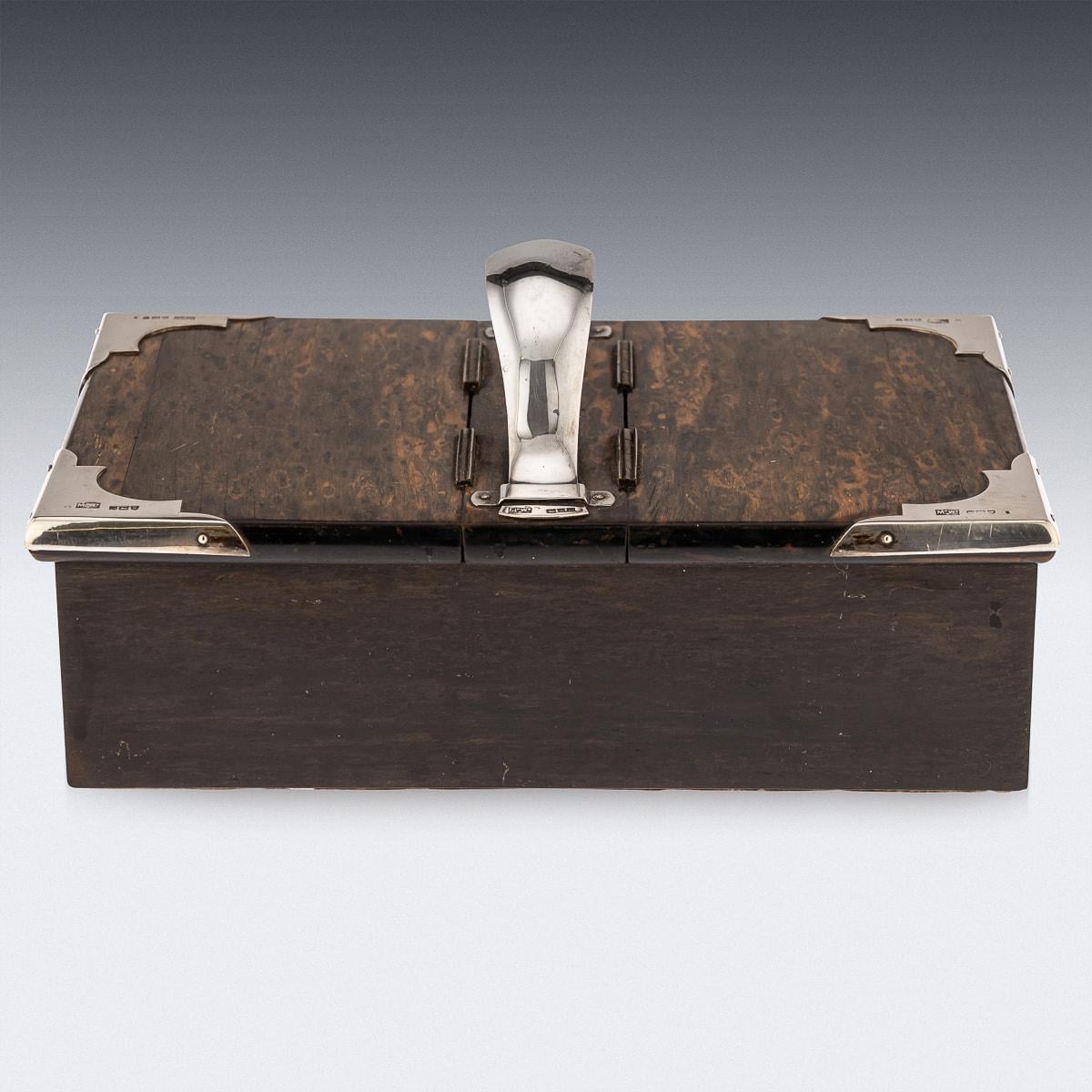 Ancienne boîte à fumer édouardienne du début du 20e siècle en bois de coromandel avec des montures en argent massif. Cette superbe boîte est fabriquée en bois de calamandre ou de coromandel, un bois très prisé originaire d'Inde et du Sri Lanka. Déjà