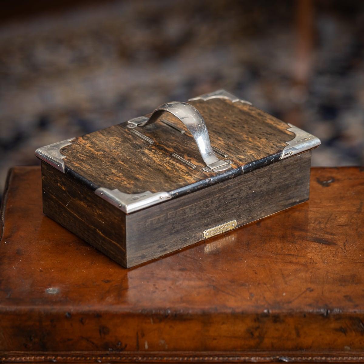Antique early 20th Century Edwardian coromandel wood smoker's box with solid silver mounts. This quite stunning box is made from the highly prized calamander or coromandel wood, native to india and Sri Lanka. Already rare due to its extinction, it