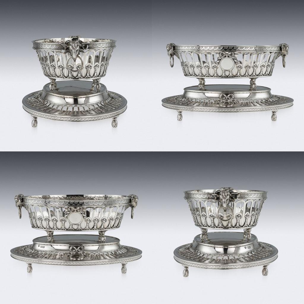Antique 20th century Edwardian neoclassical Revival set of three solid silver jardinières, of oval form, pierced body work decorated with bows and ribbons, both sides applied with realistically modeled cast rams heads, very heavy gauge and very