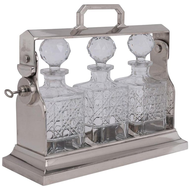 20th Century Edwardian Silver Plated and Cut Glass Tantalus, circa 1900 For Sale