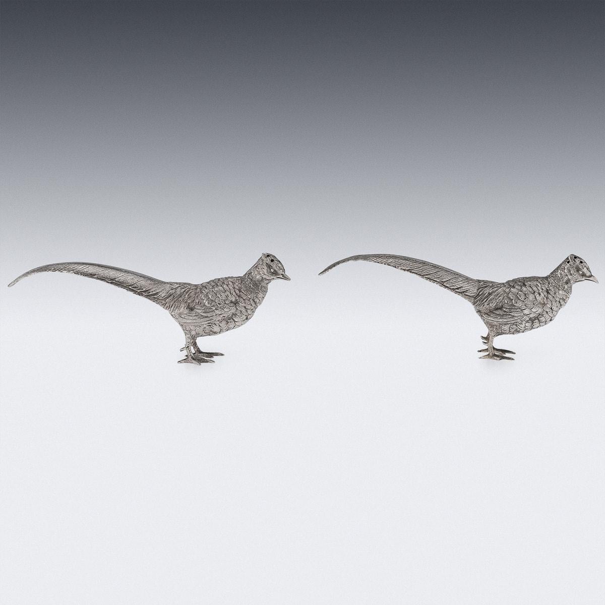 Antique early 20th Century Edwardian solid silver pair of novelty salt & pepper, each beautifully cast and realistically modelled as standing pheasants, the body cast with a detailed textured plumage, detachable heads. Hallmarked English silver (925