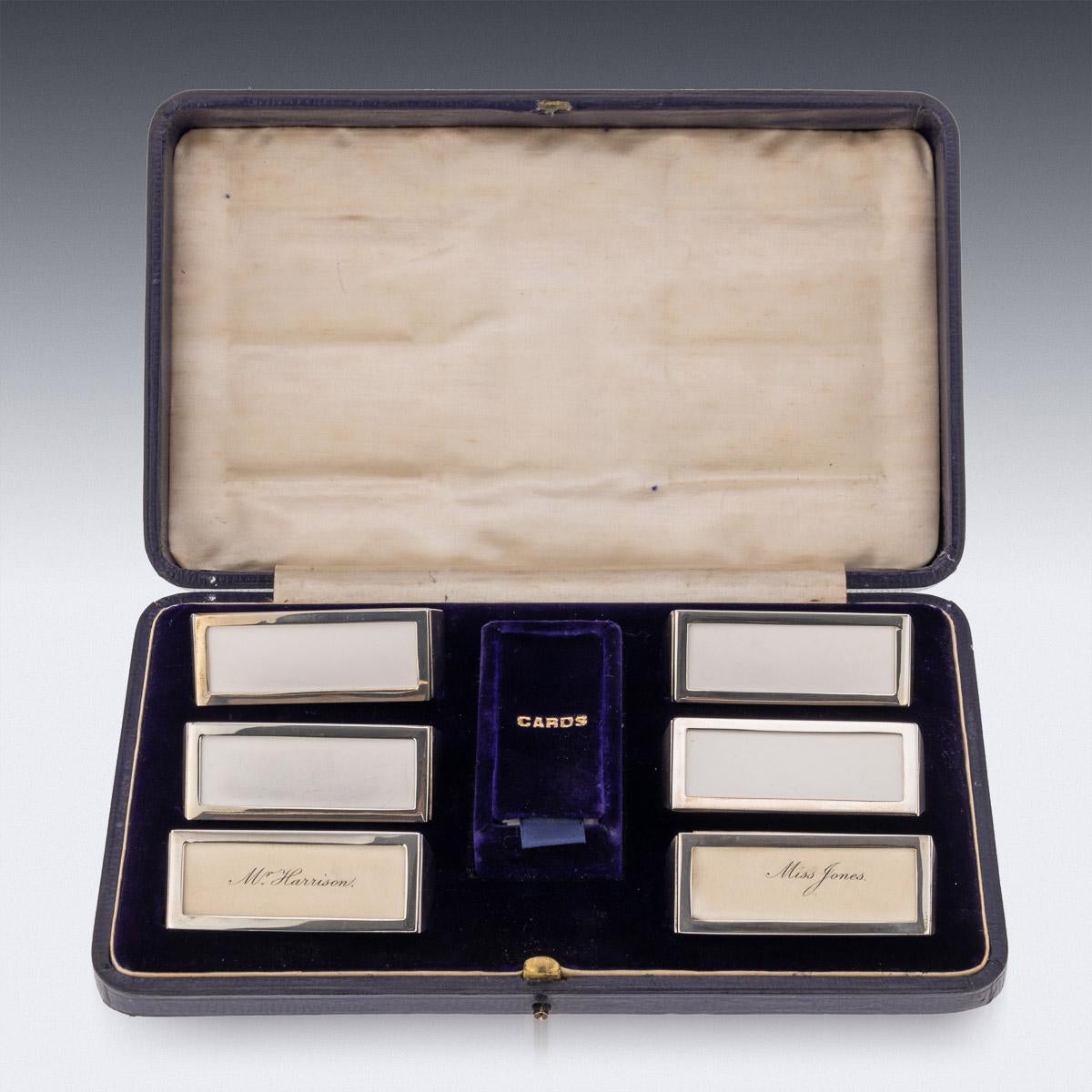 20th century Edwardian silver cased set of six napkin ring place holders. The set comes in its original leather bound case, each holder with a removable card.
Hallmarked English silver (925 Standard), Chester, year 1908 (H), Maker's mark SM&CO