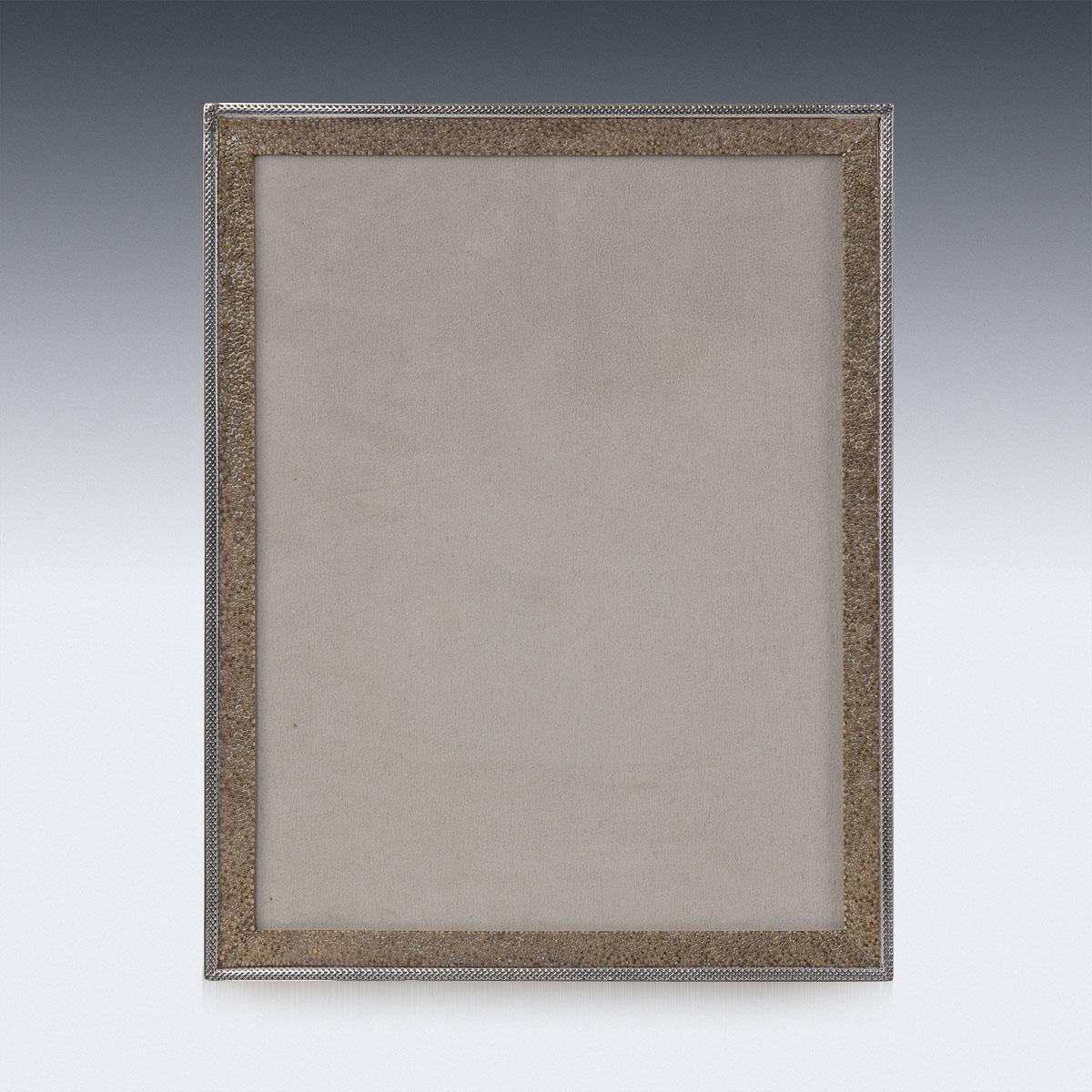 20th century British made silver & shagreen photograph frame, of rectangular form, covered behind glass and on a strut support. Hallmarked English silver (925 standard), Chester, year 1911 (L), Maker Stokes & Ireland Ltd (William Henry Stokes &