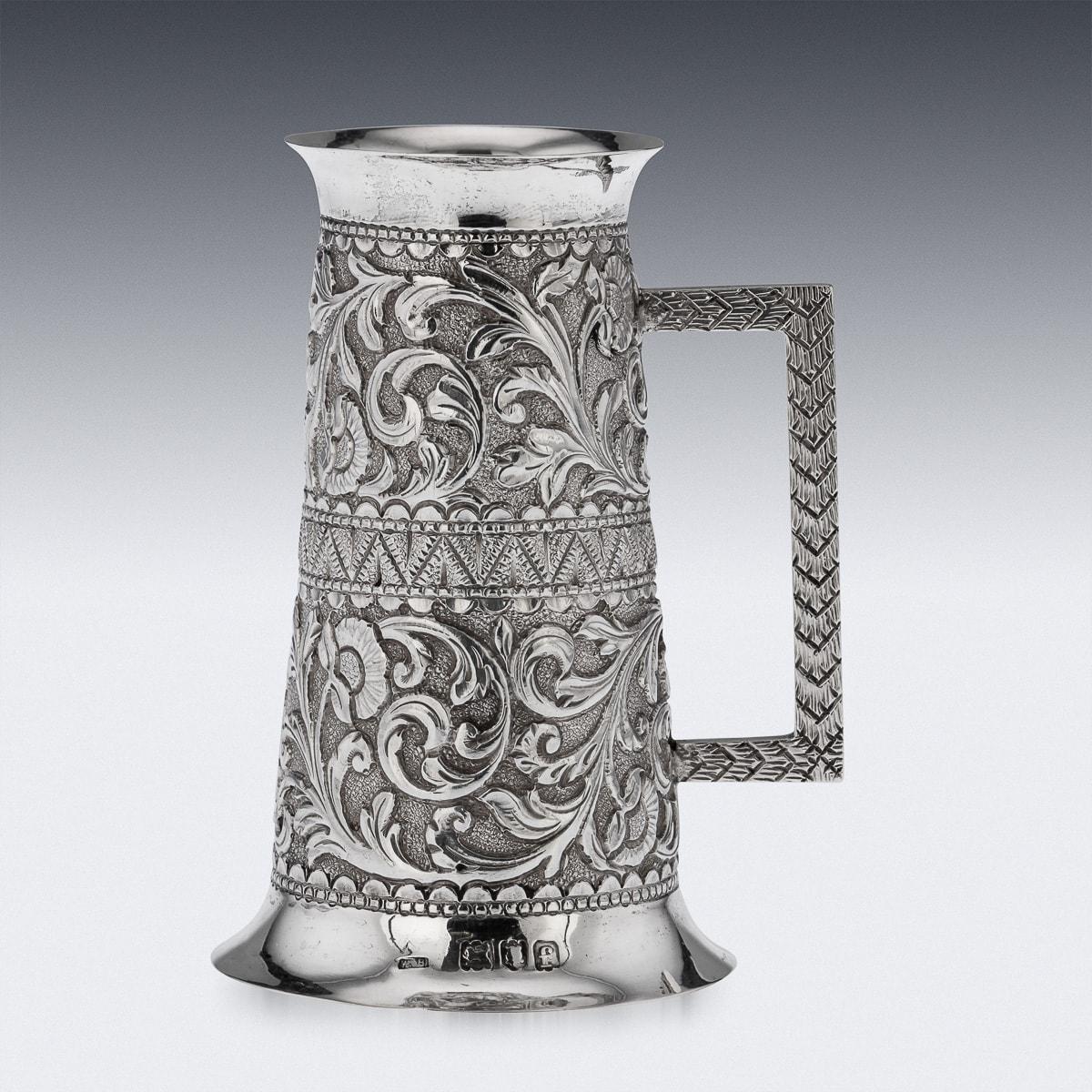 Antique early 20th Century Edwardian solid silver double spirit measure cup, of traditional size in a tapering body form decorated with Indian Kutch inspired decoration. Hallmarked English silver (925 standard), London, year 1901 (f), Maker W.B