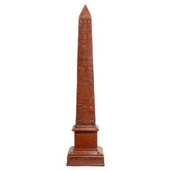 20th century egyptian revival red faux marble obelisk