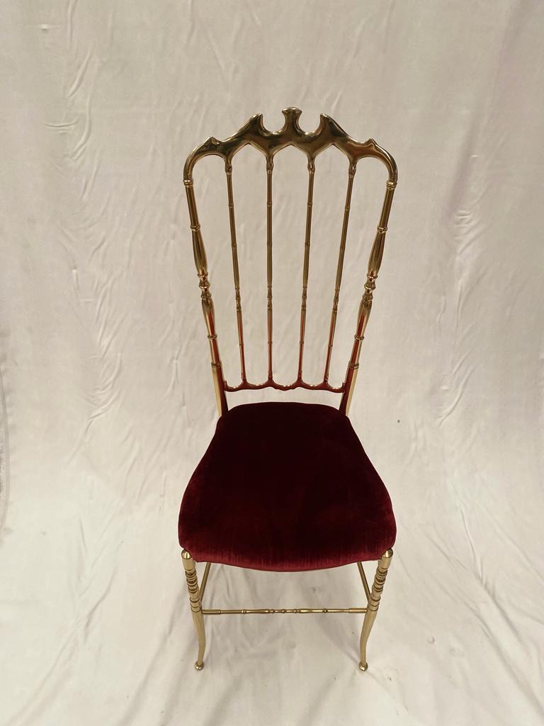 A pair of chairs made by modern and raffined material. The red Seating gives a touch of class to your room. It's made by brass created by Mice Versailles. 
