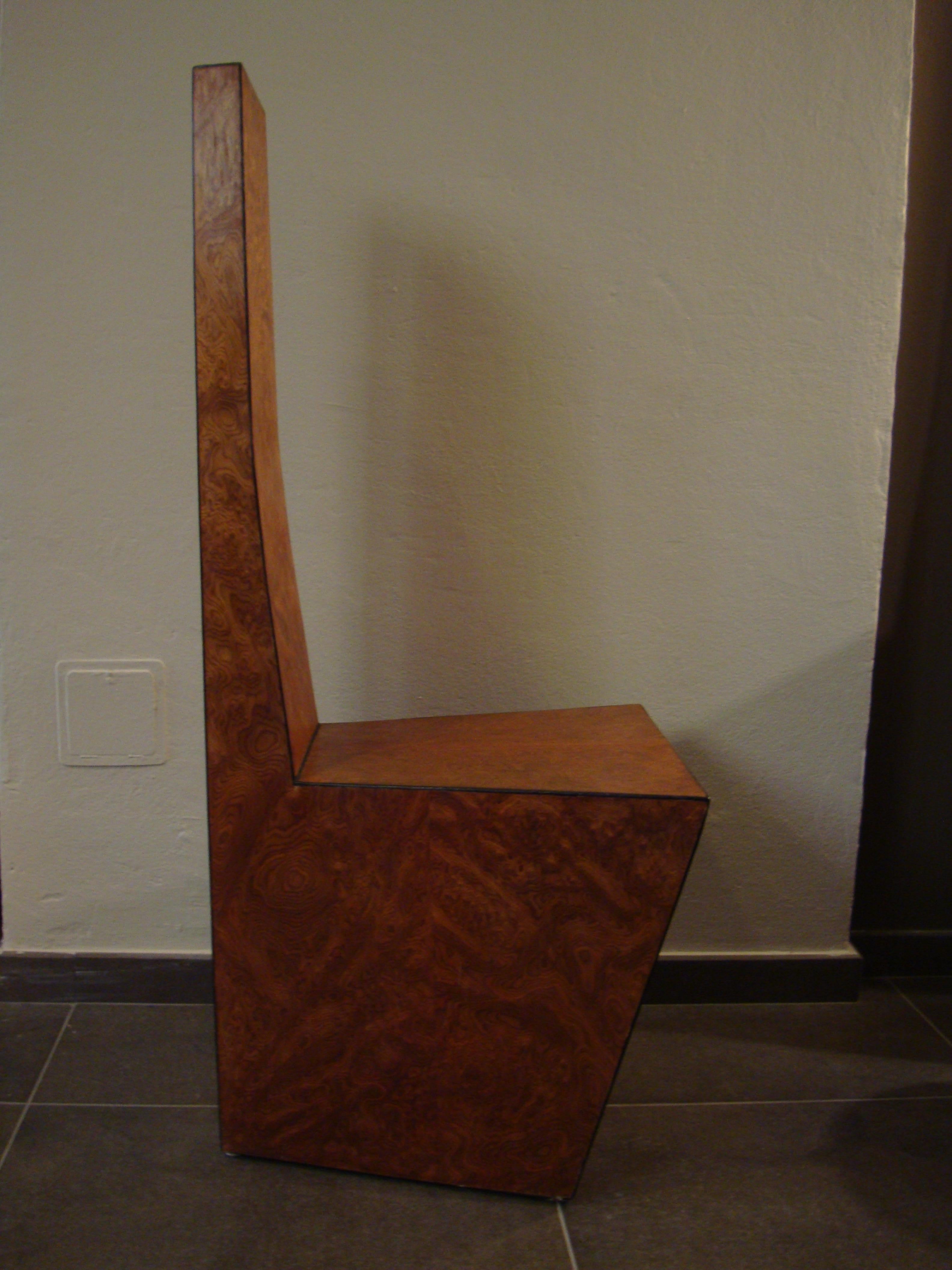 Sculpture chair produced for a Milanese residence, circa 1980. Outlined on the edges by a slight black thread. This is a single and unique piece created by a crafted ebanist maker.