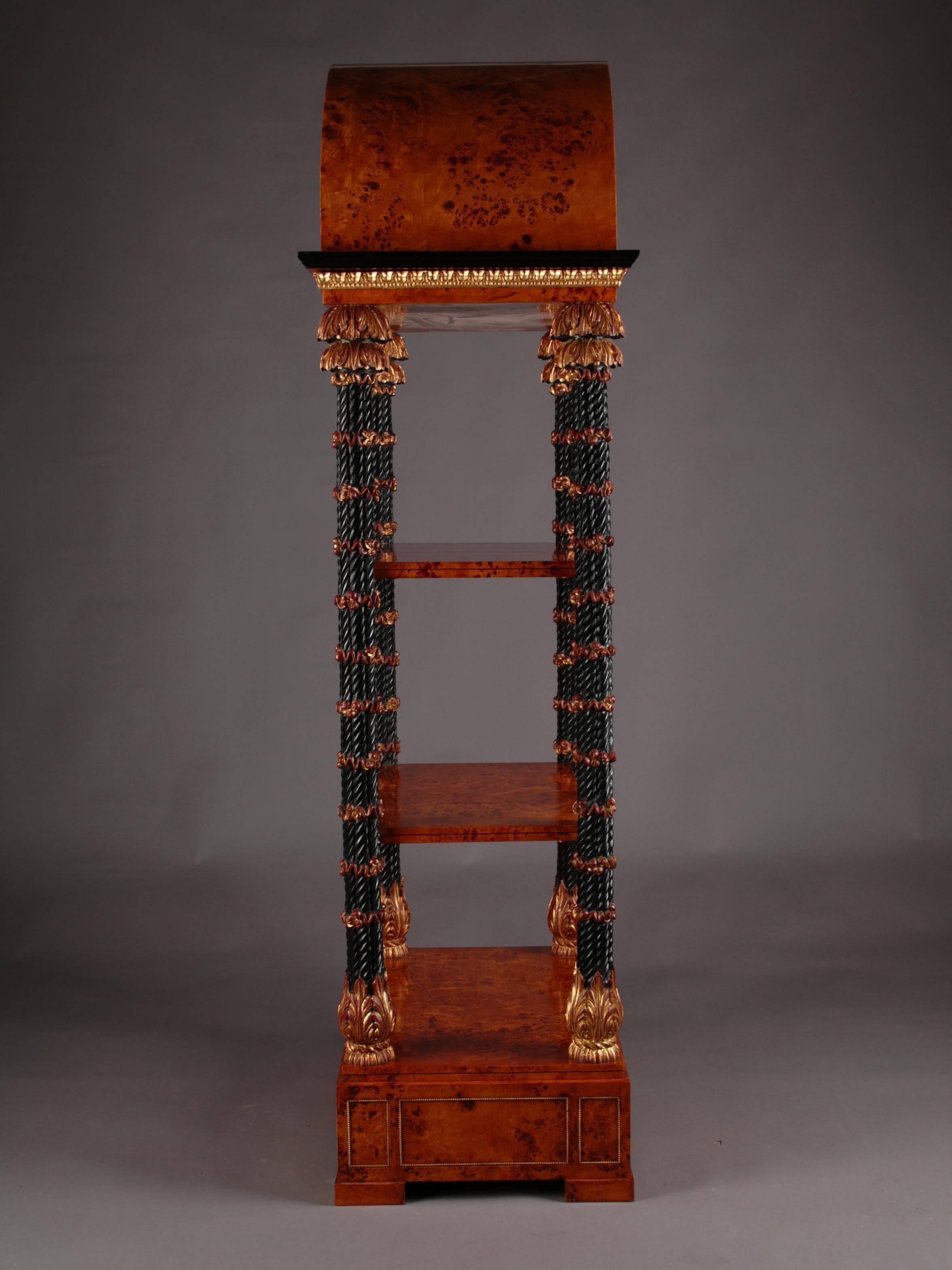 20th Century Empire Etagere/Showcase, maple 

Aristocratic étagère in Royal-Donau style.
Maple root and solid fully moulded carved beechwood. Partially gilded. Highly, right-angled body, architecturally structured body with two shelf boards and
