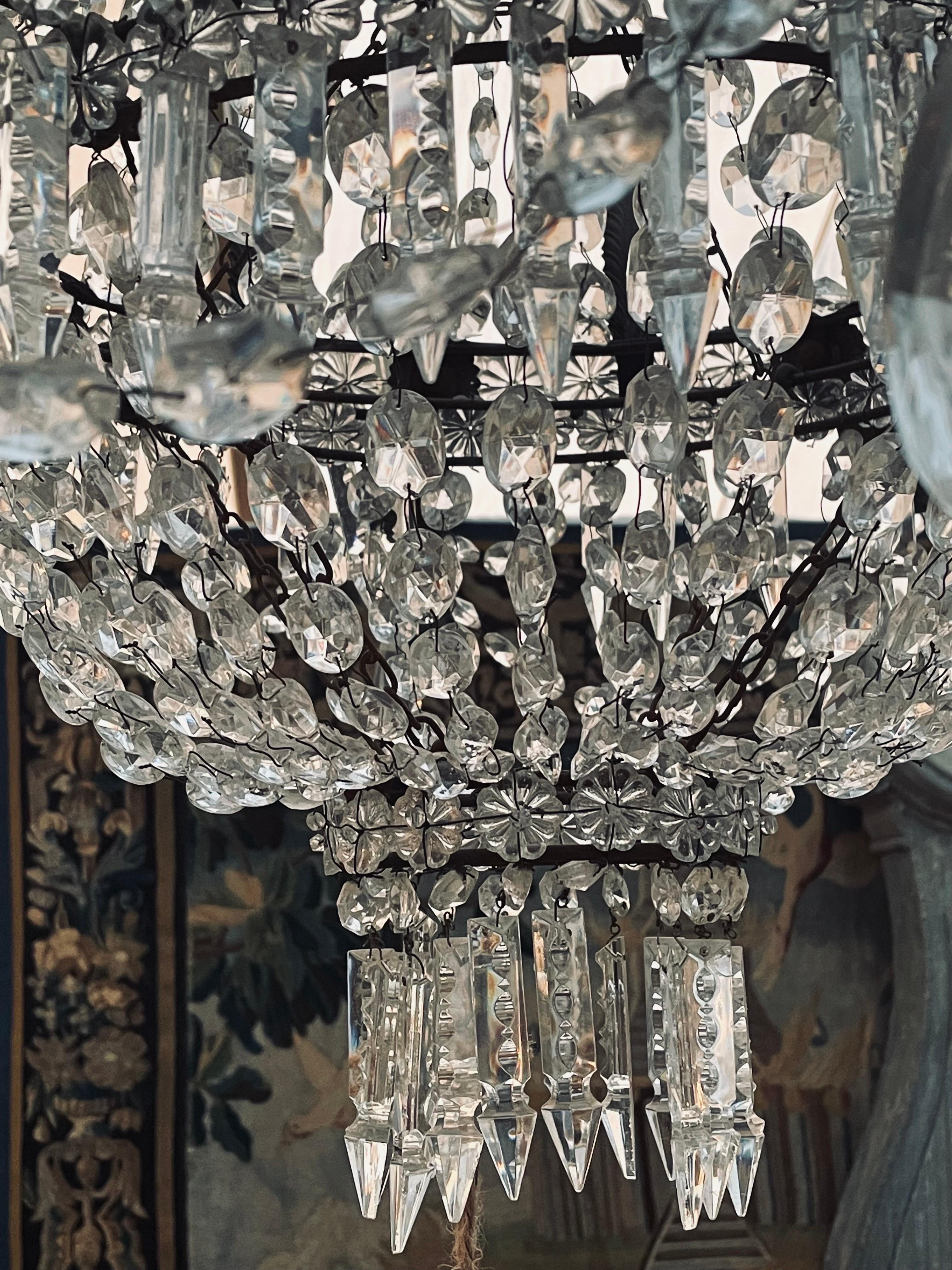 A gorgeous and large empire shaped Italian crystal chandelier that has been recently cleaned. Rewired to meet US Standards. This chandelier exudes luxury to the max. Large and simple we feel that it will look fantastic in any setting whether it be a