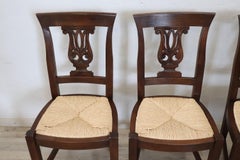 20th Century Empire Style Set of Four Walnut Chairs with Straw Seat
