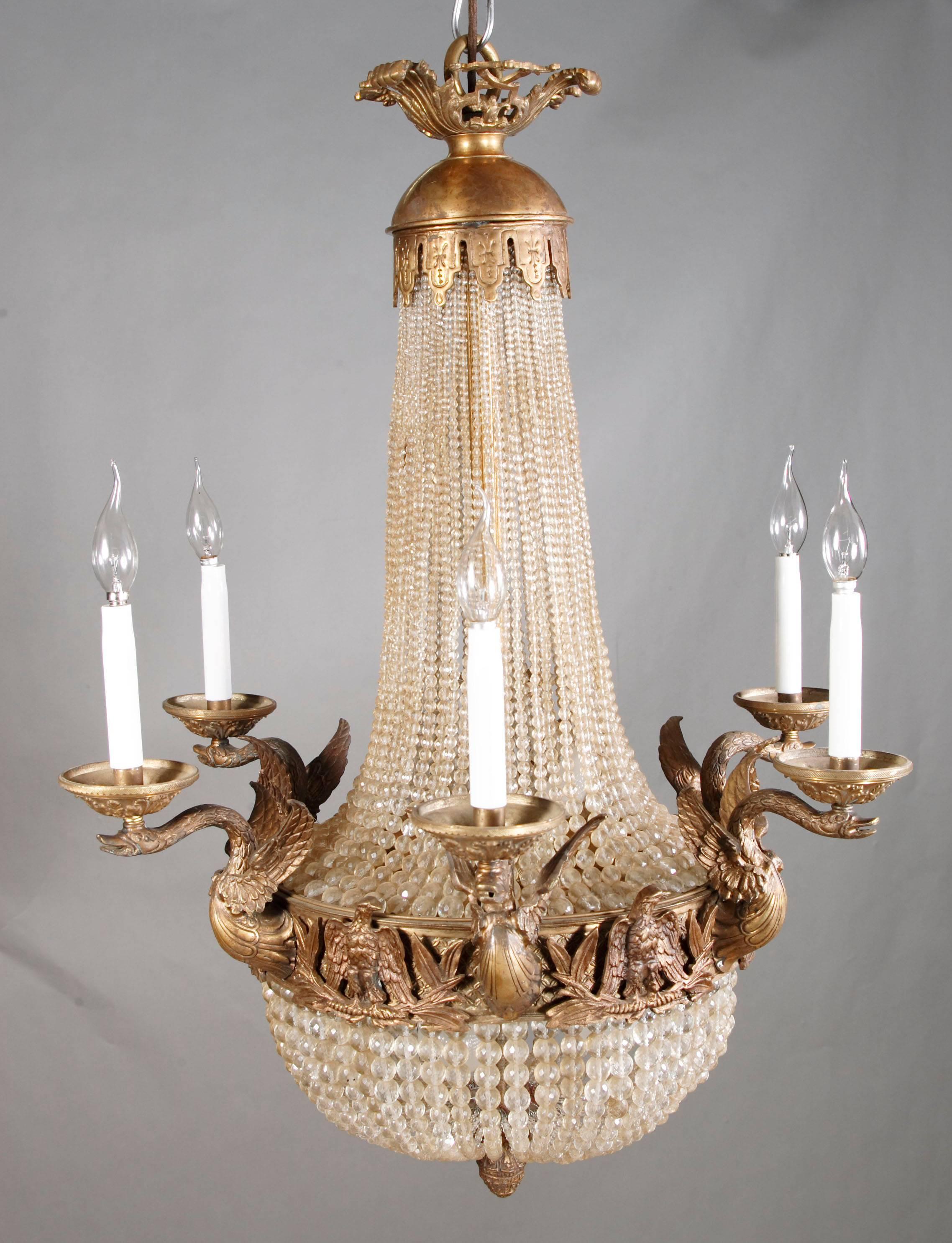 Splendid chandelier or candelabra in French Empire style
Bronze patinated. There from, a with six swans designed light arms.

(F-Ks-2).
