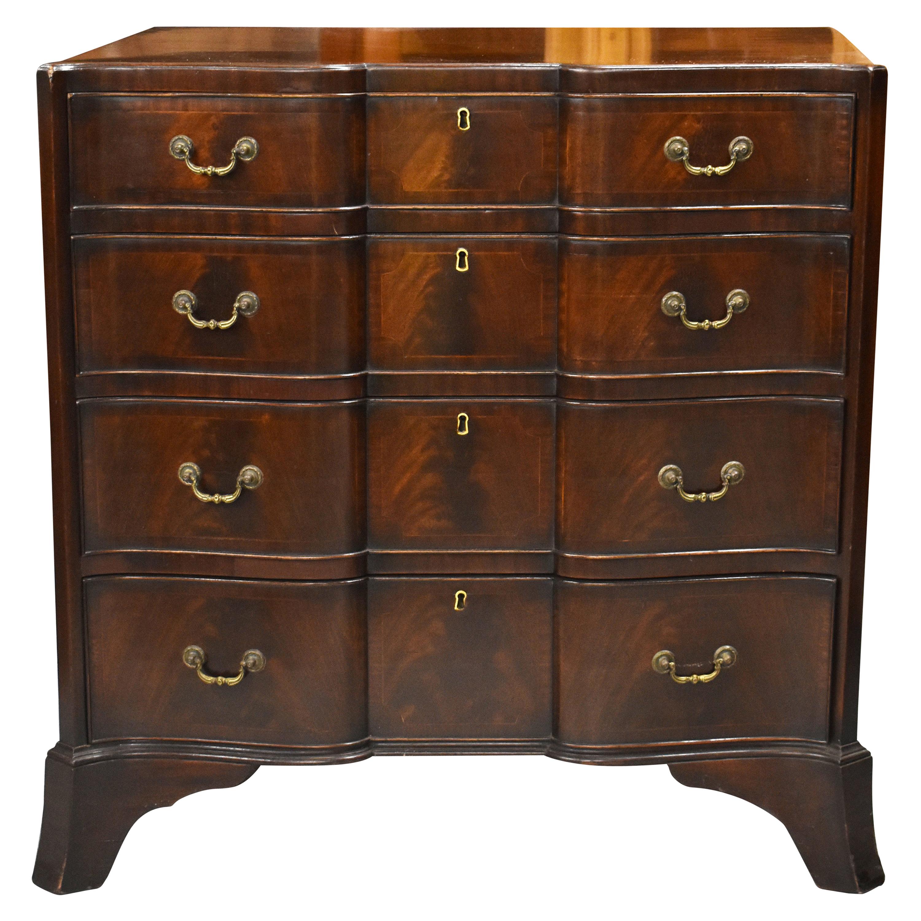 20th Century English Antique Edwardian Flame Mahogany Serpentine Chest For Sale