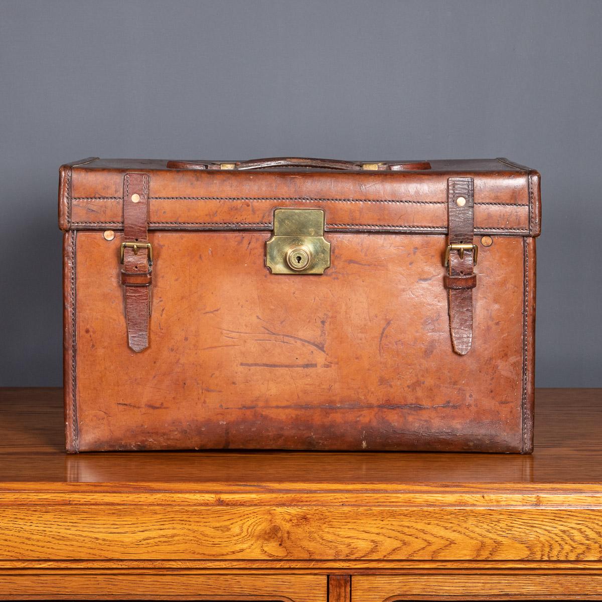 Antique early-20th Century Asprey small tan leather documents case with red leather lift out tray, with the initials MALM. The case is oozing style and elegance, this case makes for a fantastic conversation piece, a very practical item suitable for