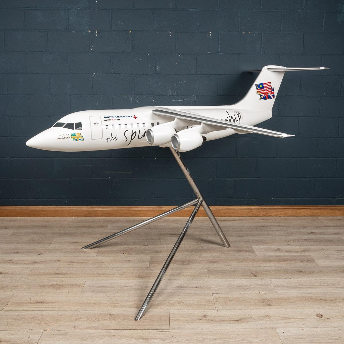 An massive and impressive boardroom model of a British Aerospace 146 /Avro RJ, made out of softwood and plaster or fibreglass and displayed on a purpose-built stand. Made in the mid 1990s, this imposing model was produced to commemorate the