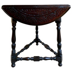 Antique 20th Century English Carved Dark Oak Envelope Handkerchief Drop-Leaf Table Round