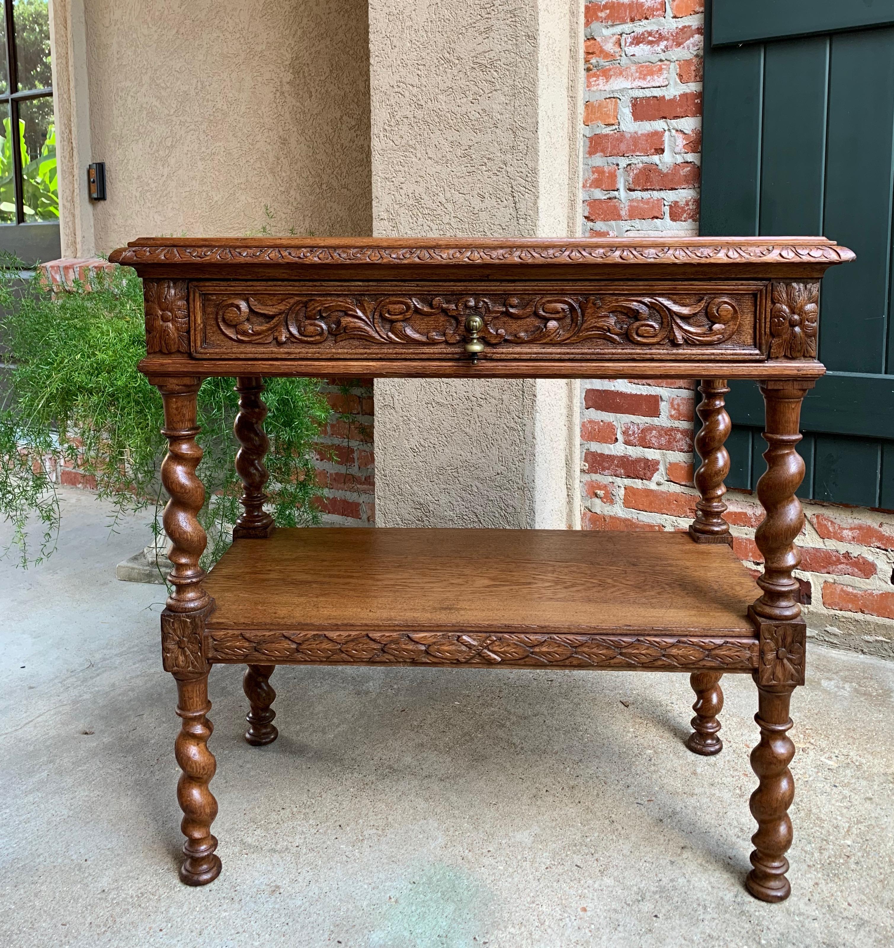 Direct from England, a lovely antique French sideboard or server in a great smaller size with that lighter finish/bleached look everyone is searching for!~
~Carved beveled edge tabletop~
~Full length front drawer with carved Black Forest style