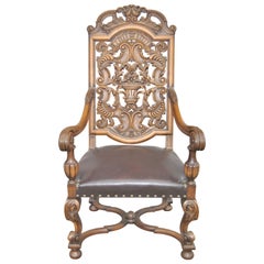 Fauteuil en chêne anglais sculpté de style élisabéthain, XXe siècle