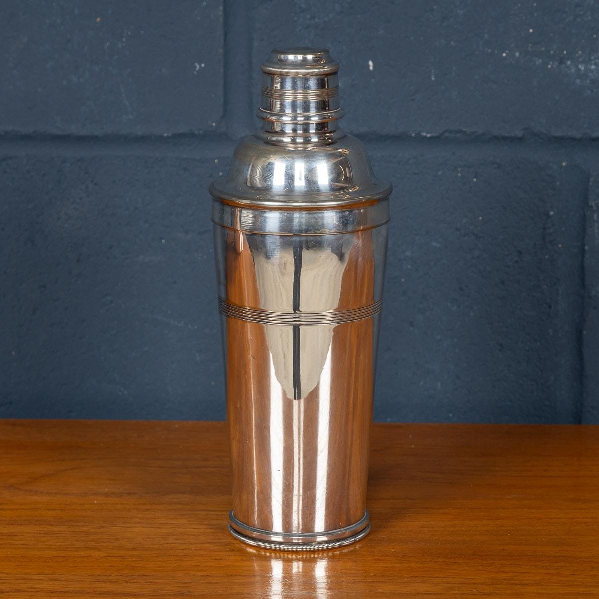 A rare and extremely unusual cocktail shaker made in England in the early part of the 20th century. Of particular interest is the double skinned construction of the shaker. The underside unscrews to reveal a compartment dedicated solely for ice.