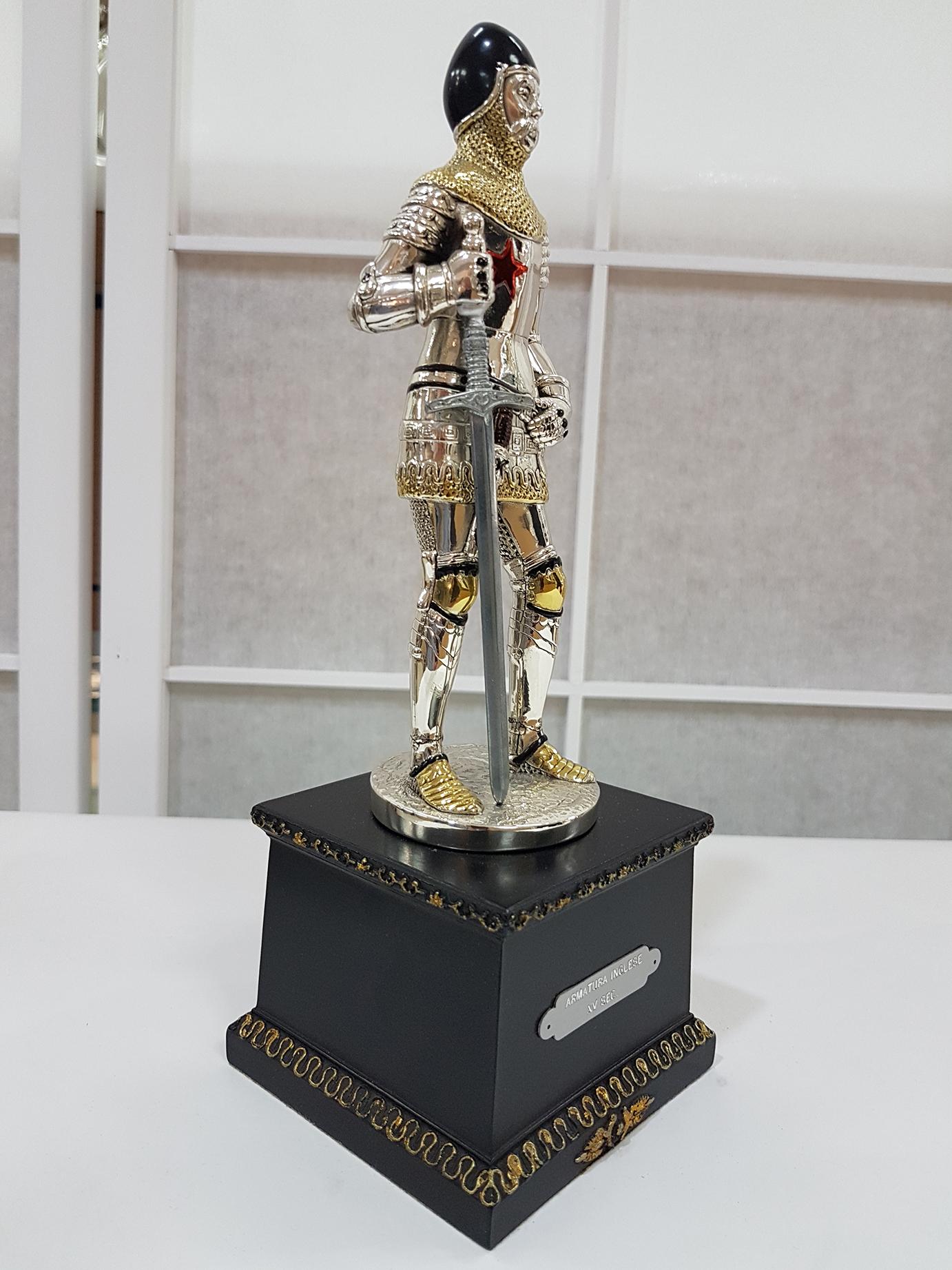 Figure realized in Sterling Silver using the lost wax process.
The details are gilded and enameled.
The figure is 18 cm high and depicts a 15th century Italian soldier with sword and dagger
The wood square base is 7 cm high where there is an