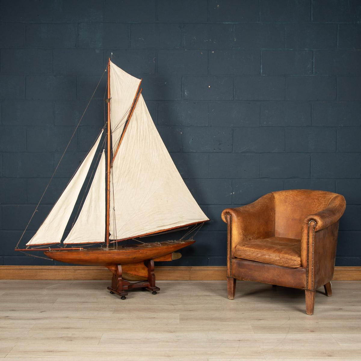 A fantastic antique Gaff Cutter pond yacht, with a lovely carved planked wood hull dating to the first half of the 20th century. The yacht is a great example of a British pond racing yacht and would have raced against similar yachts in competitions,