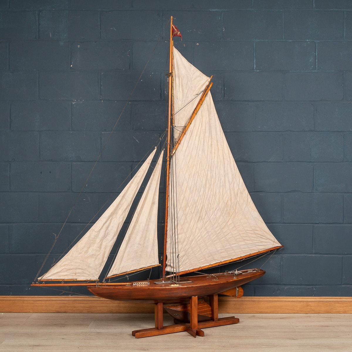 A massive antique gaff rigged cutter pond yacht, lovely “plank on frame” hull dating to the first half of the 20th century. The yacht is an example of British pond racing yacht and would have raced against similar yachts in competitions, club