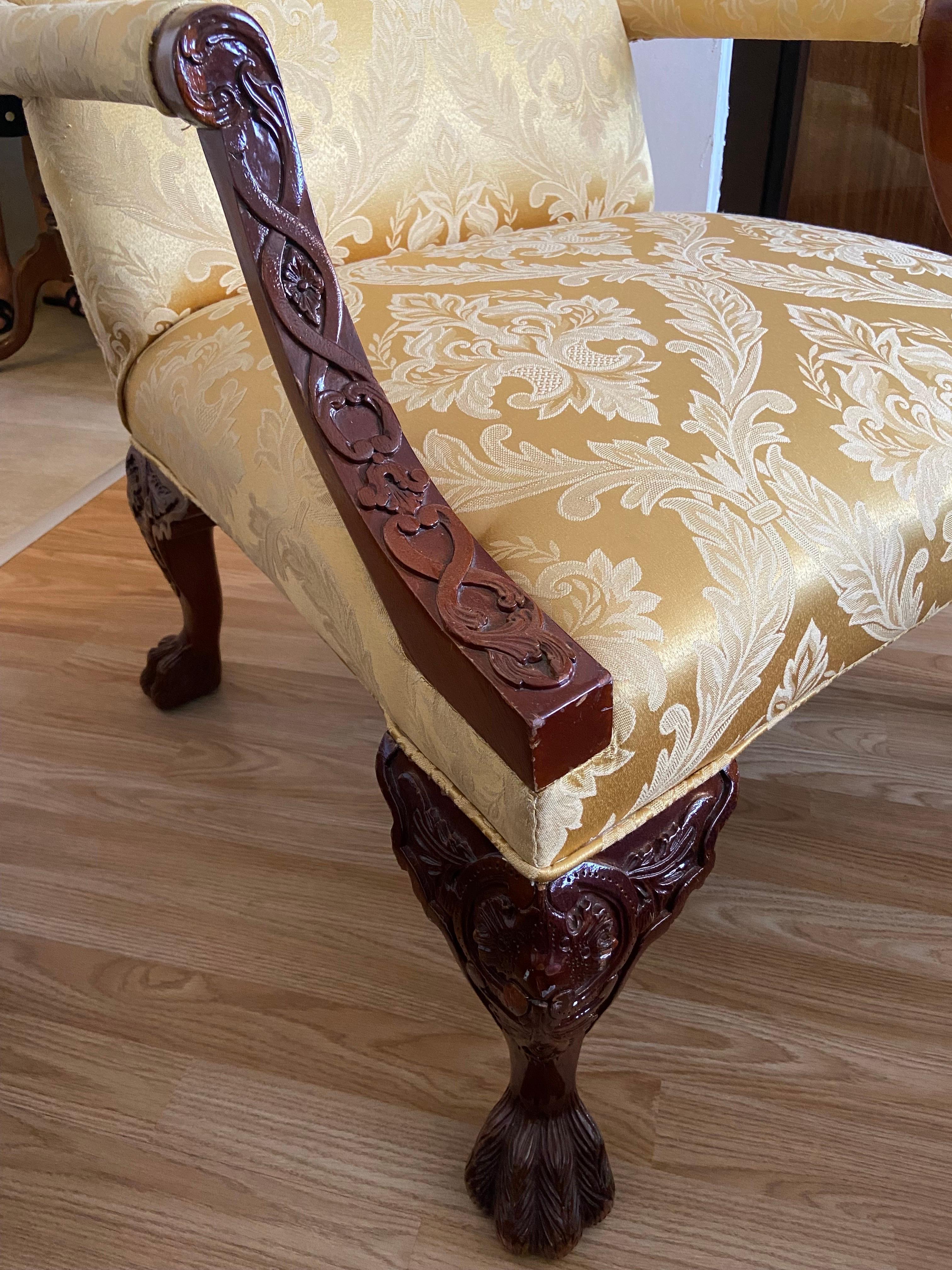Grand hand carved mahogany armchairs in yellow silk upholstery made in late 20th century. Very comfortable and in good condition.
   