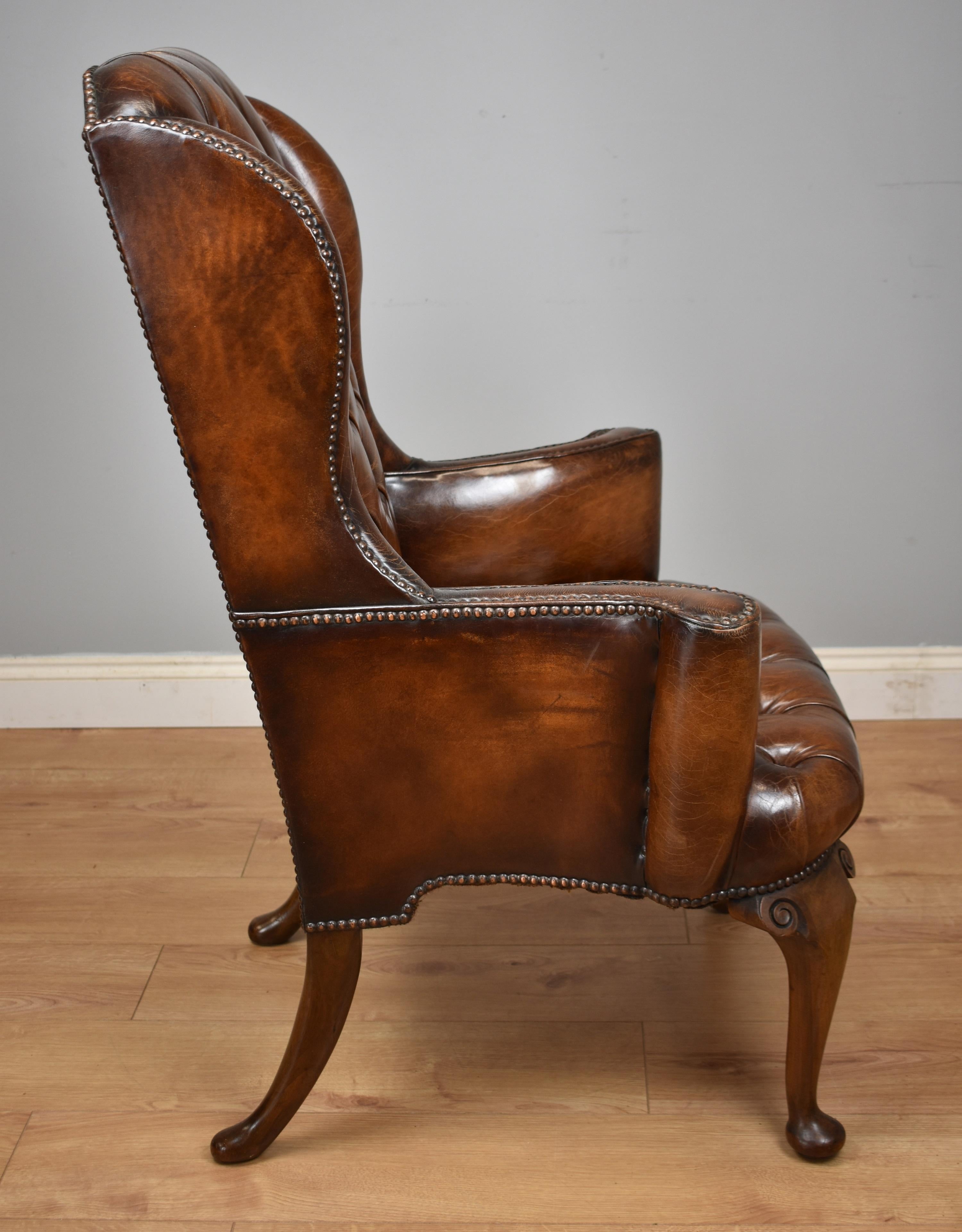 distressed brown leather armchair