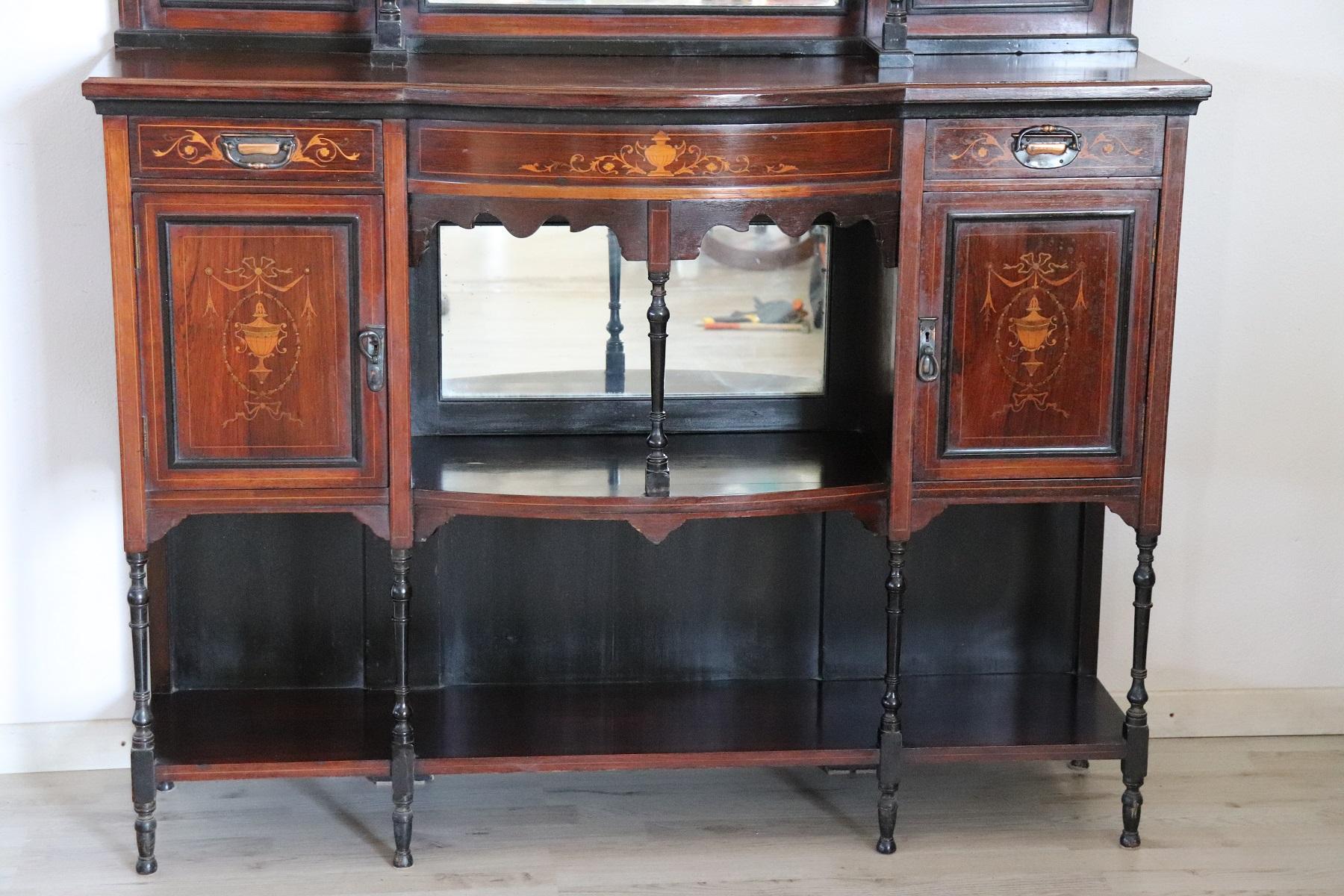 Very beautiful spectacular representative furniture in fine finely inlaid rosewood. Inlay representations of Classic taste. Detail mirror at the bottom. Perfect piece of furniture to embellish an entrance or a large hall.
  