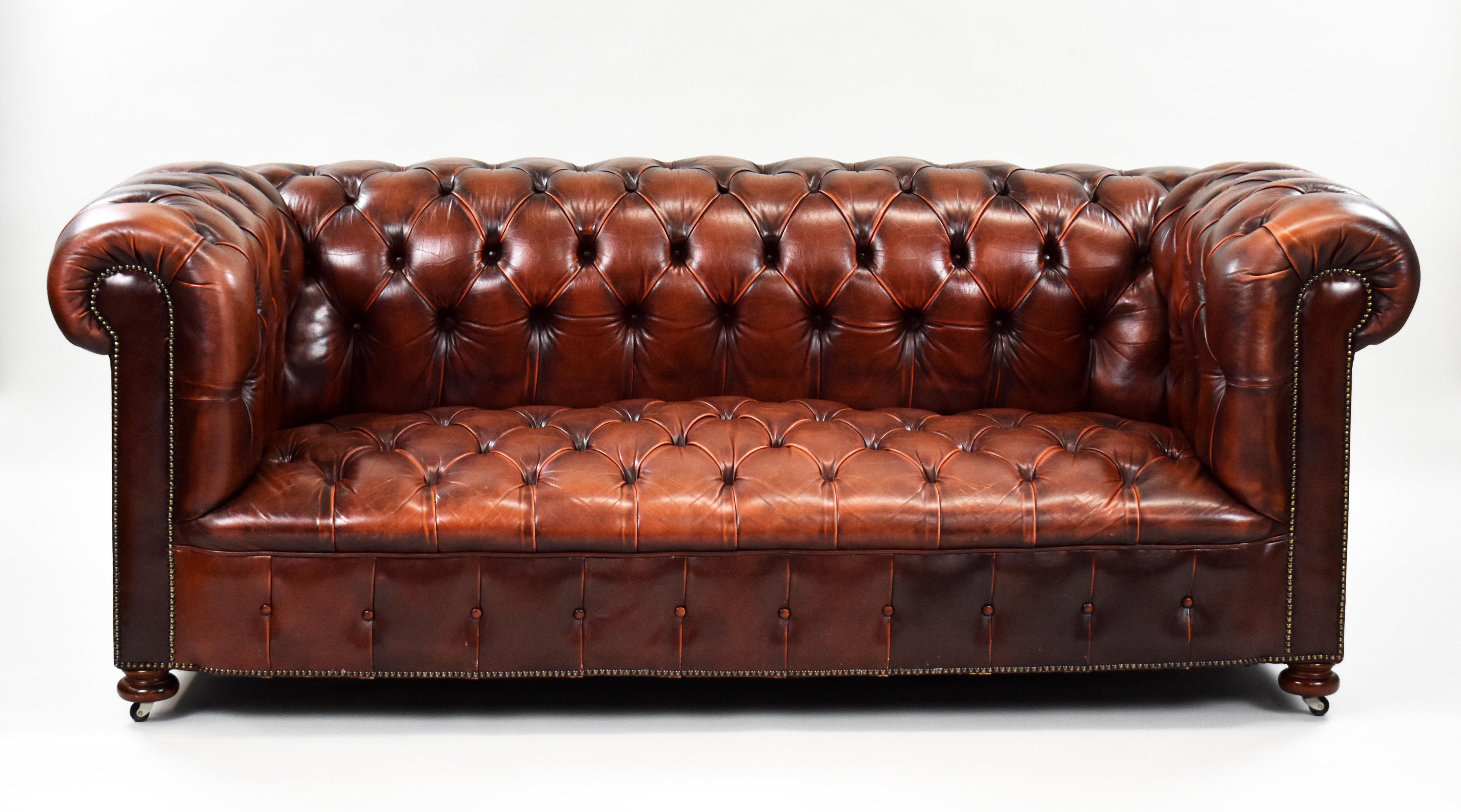 For sale is a good quality 1960's leather chesterfield suite comprising of a leather chesterfield sofa and two deep buttoned armchairs standing on claw and ball feet. All of the items in the suite remain in very good condition for their age.