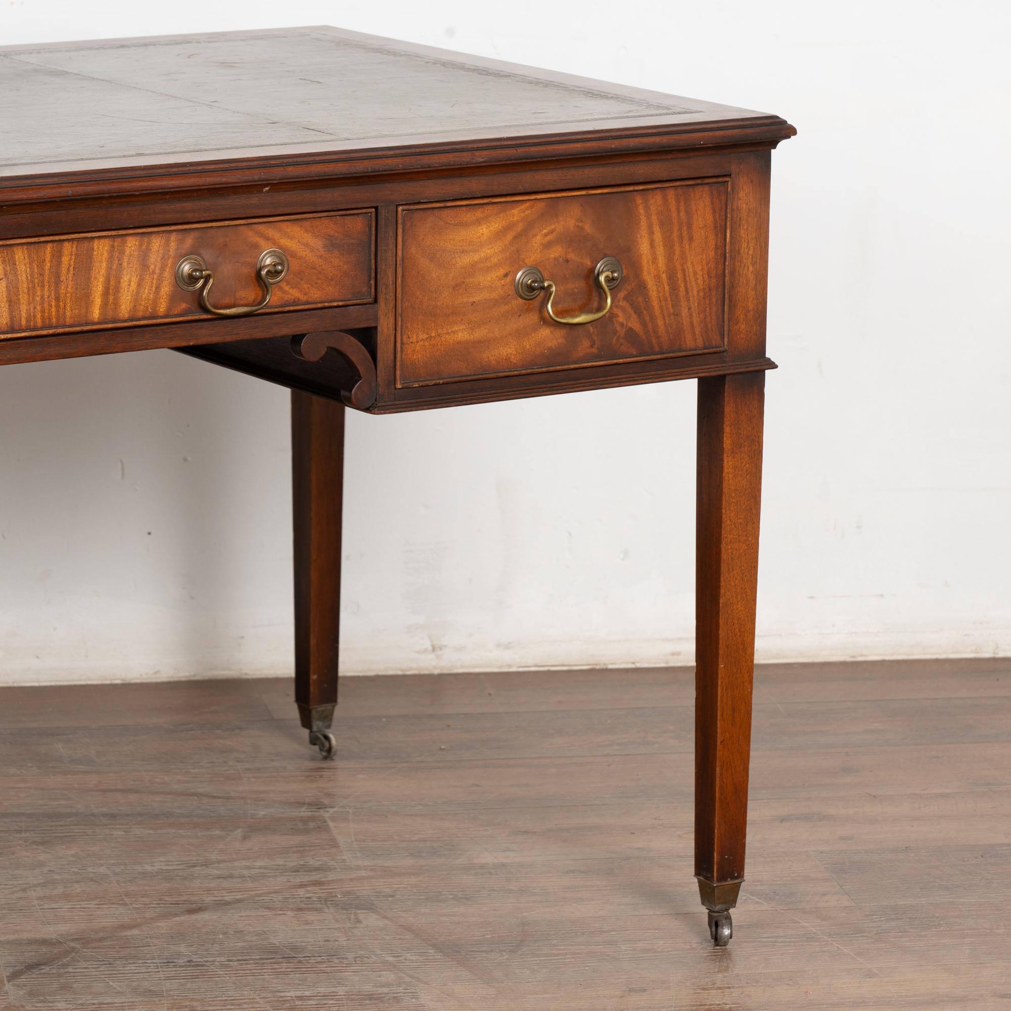 20th Century English Mahogany Writing Desk With Three Drawers Green Leather Top 7