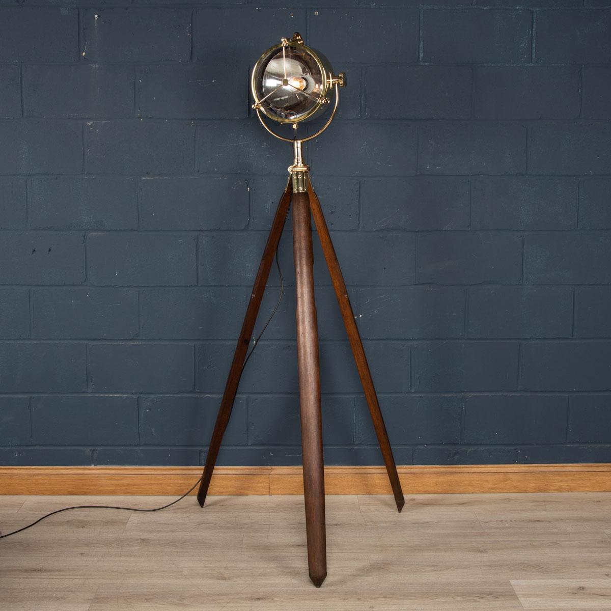A fantastic mid 20th century English naval searchlight, mounted on an earlier 20th century tripod. These lamps would have been mounted on military or shipping vessels.

Condition
In Good Condition - some minor dents throughout (please refer to