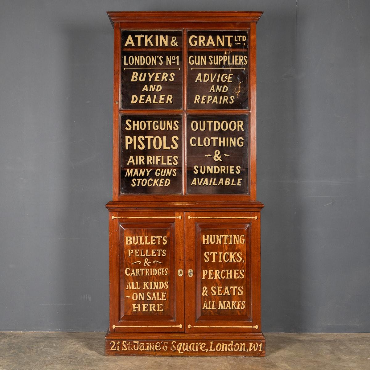Antique 19th Century English walnut gun cabinets, with working locks and keys. Beautiful pieces of period furniture, later painted with various shooting related advertising and compartments for various cartridges and shooting accessories, a very