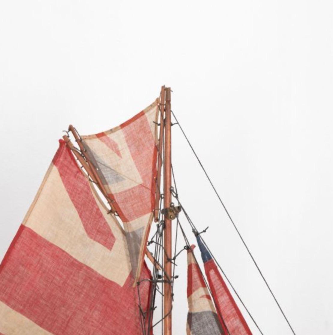 English pond yacht re-rigged with original Union Jack flags