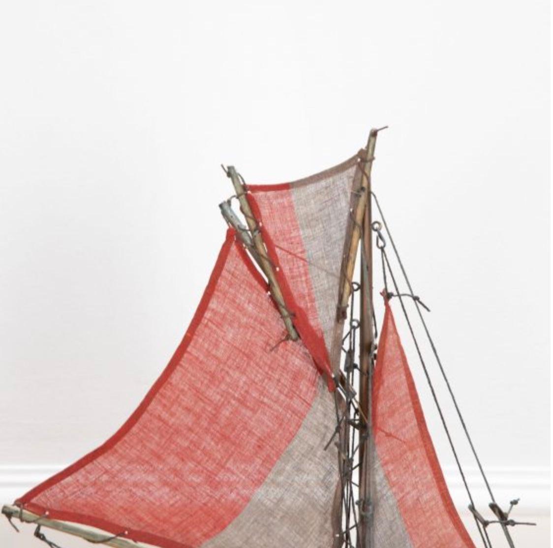 English pond yacht re-rigged with original Union Jack flags