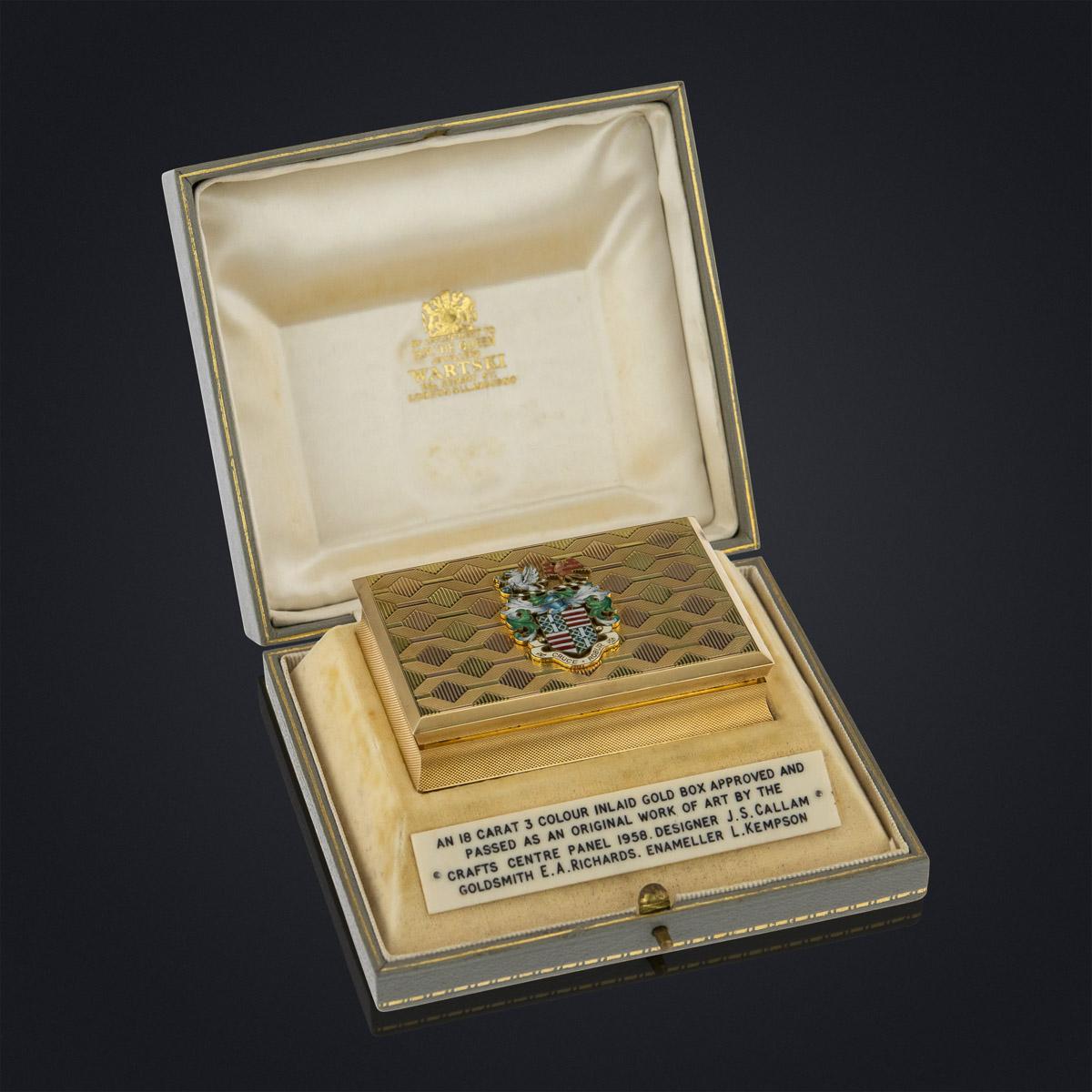 Stunning 20th century English presentation three-colored 18-karat gold snuff box, of rectangular form with slightly inverted sides, beautifully engraved with engine turned decoration and applied with a large enamel heraldic coat of arms with the